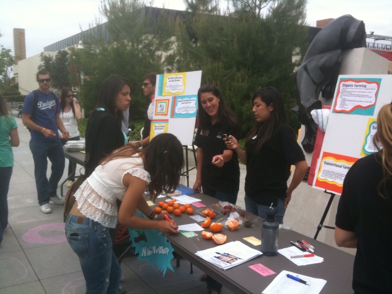 students talking at event table
