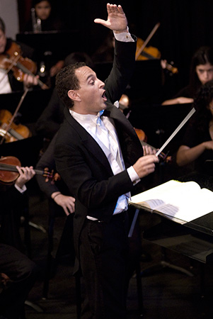 Daniel Alfred Wachs, pictured here conducting Chapman's annual Sholund Concert, made a debut appearance in Disney Hall as a concert pianist.