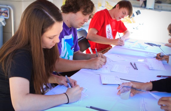 Students take a moment to write thank you notes during recent "Thank-a-Donor" event organized by the Student Philanthropy Initiative.