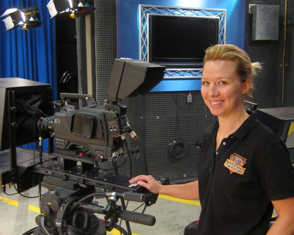 NASA cinematographer Jillian Arnold (MFA '07) reminds students there's work beyond Hollywood. Arnold is pictured here in the at Dodge College of Film and Media Arts studio, where she teaches electronic cinematography.