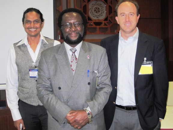 While in China for the conference Brennan Peterson (right) participated in a panel discussion that included Dennis Francis (left) a professor of sociology and education at the University of Free State in South Africa and Michael Mbizbo (center) director of reproductive health for the World Health Organization.