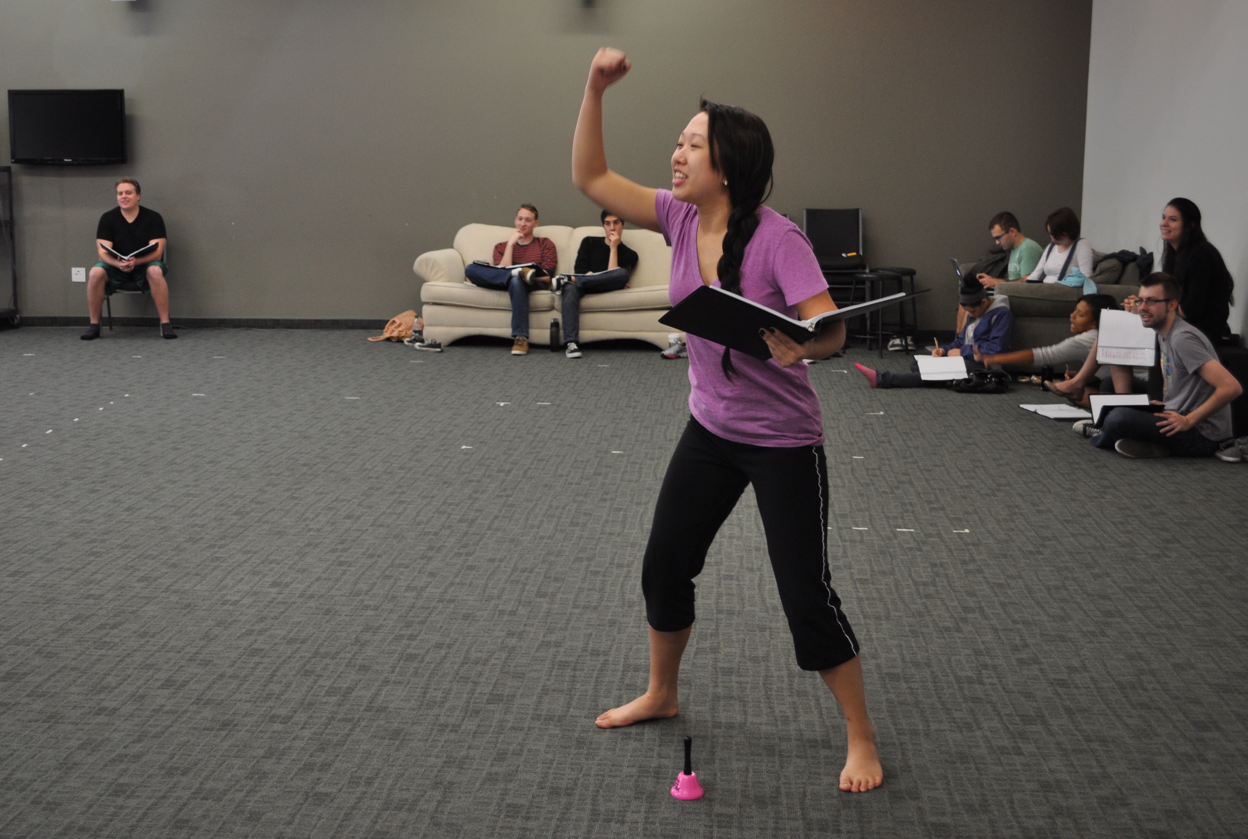 Cindy Nguyen '14 brings punch to the role of Feste the clown during early rehearsals.