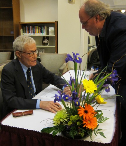 Trustee David C. Henley signs his new book after a book talk at Leatherby Libraries.