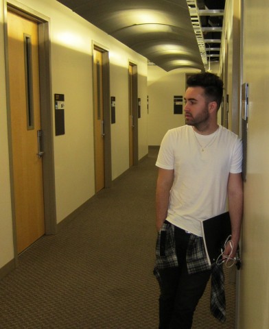 man standing in hallway