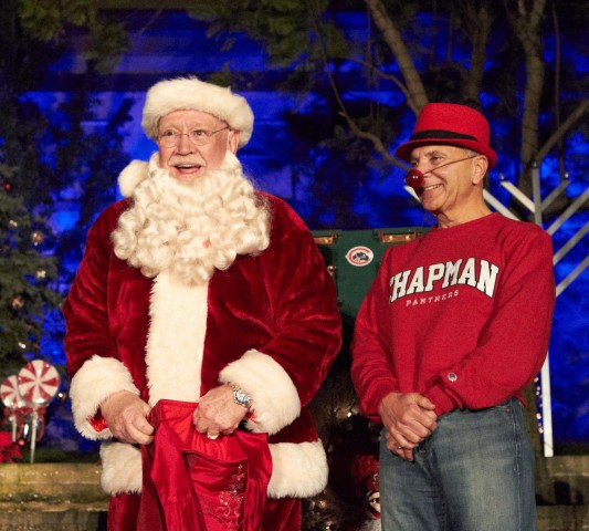 Santa (Chairman of the board Doy Henley) and President Jim Doti led the holiday fun at last year's WinterFest.