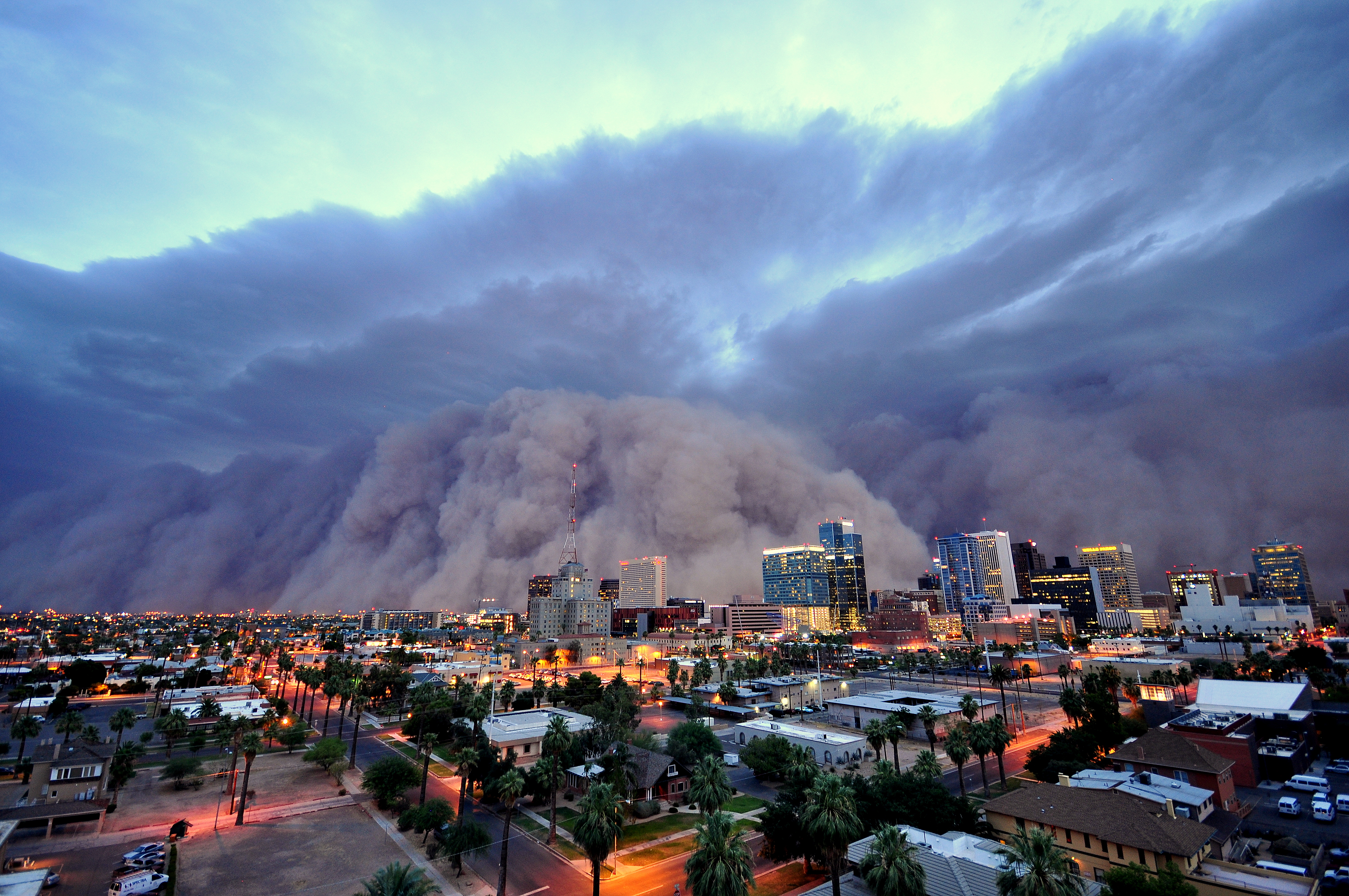 big smoke clouds over city