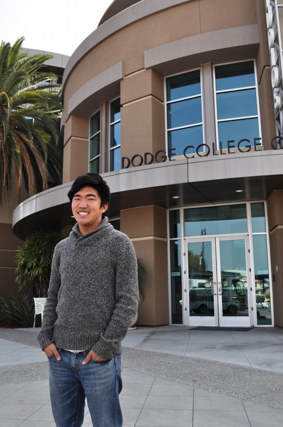 student standing in front of Dodge college