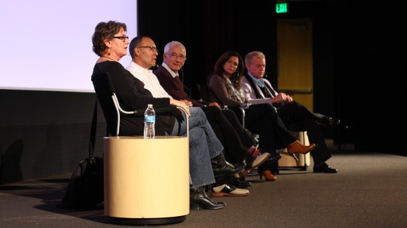 panel talking to a crowd