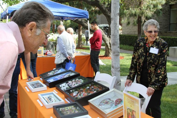 people looking at a display