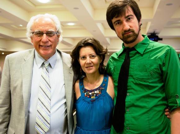 three people smiling