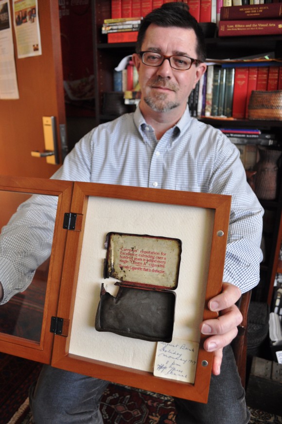 man holding a frame