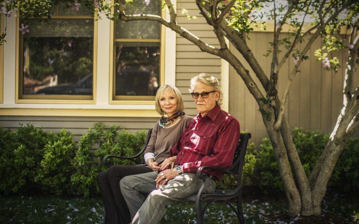 two people sitting outside