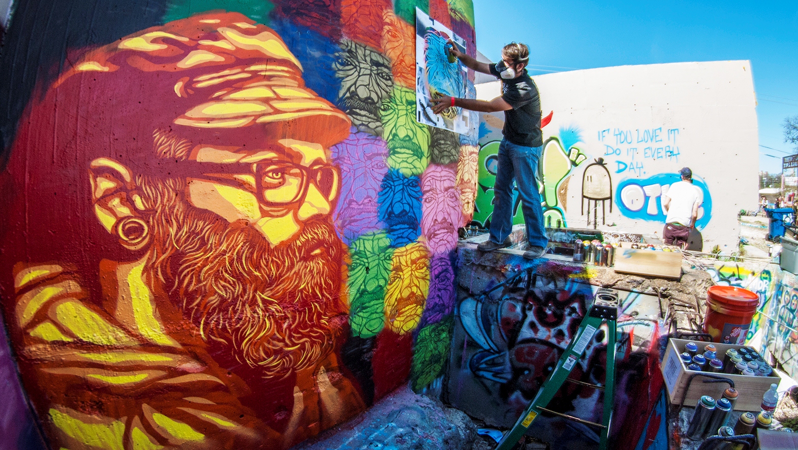 artist painting a mural
