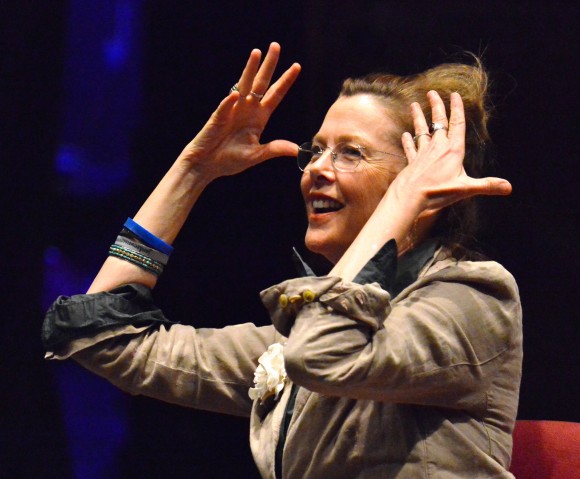 woman talking with hands in the air