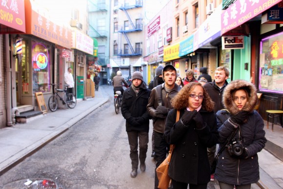 group walking down street