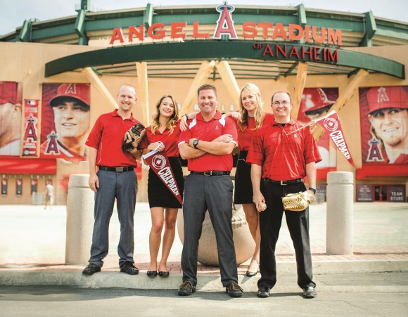 group of people outside of baseball stadium