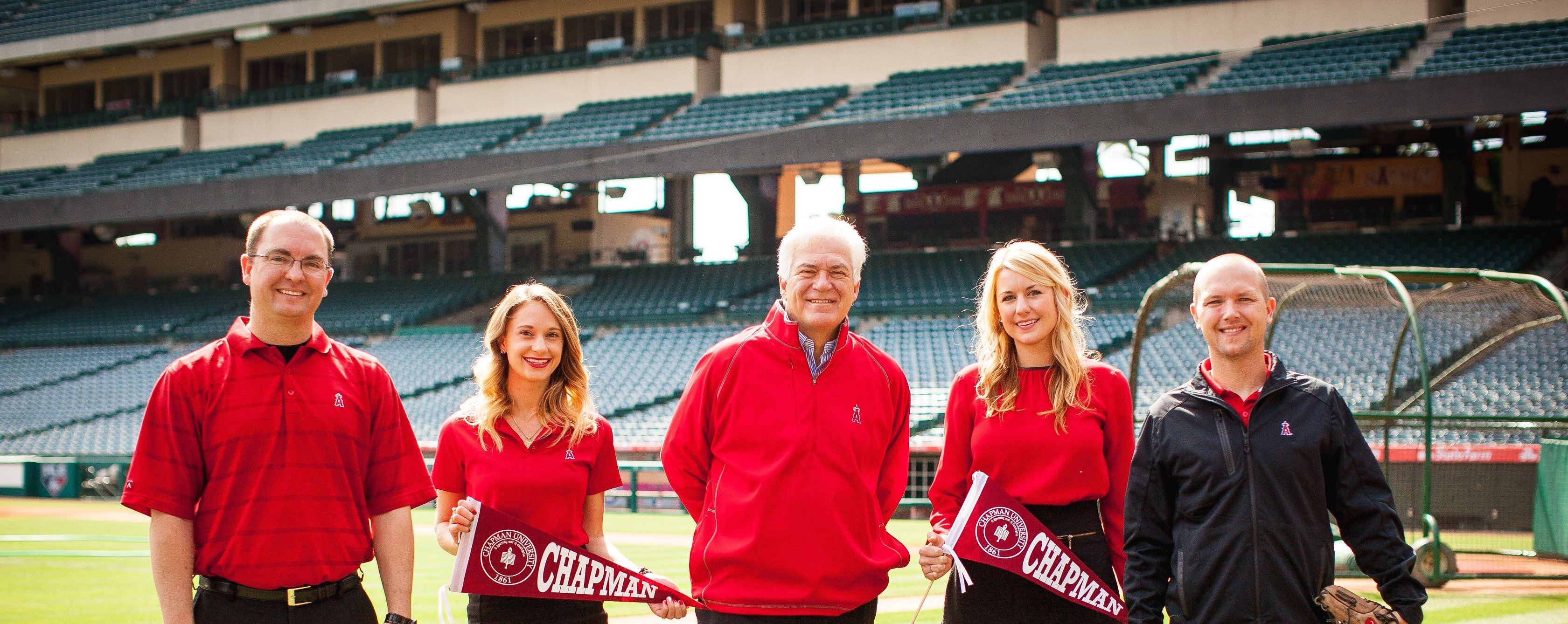 group of people on baseball field