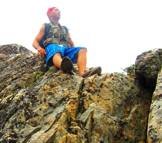 Man sitting on a rock