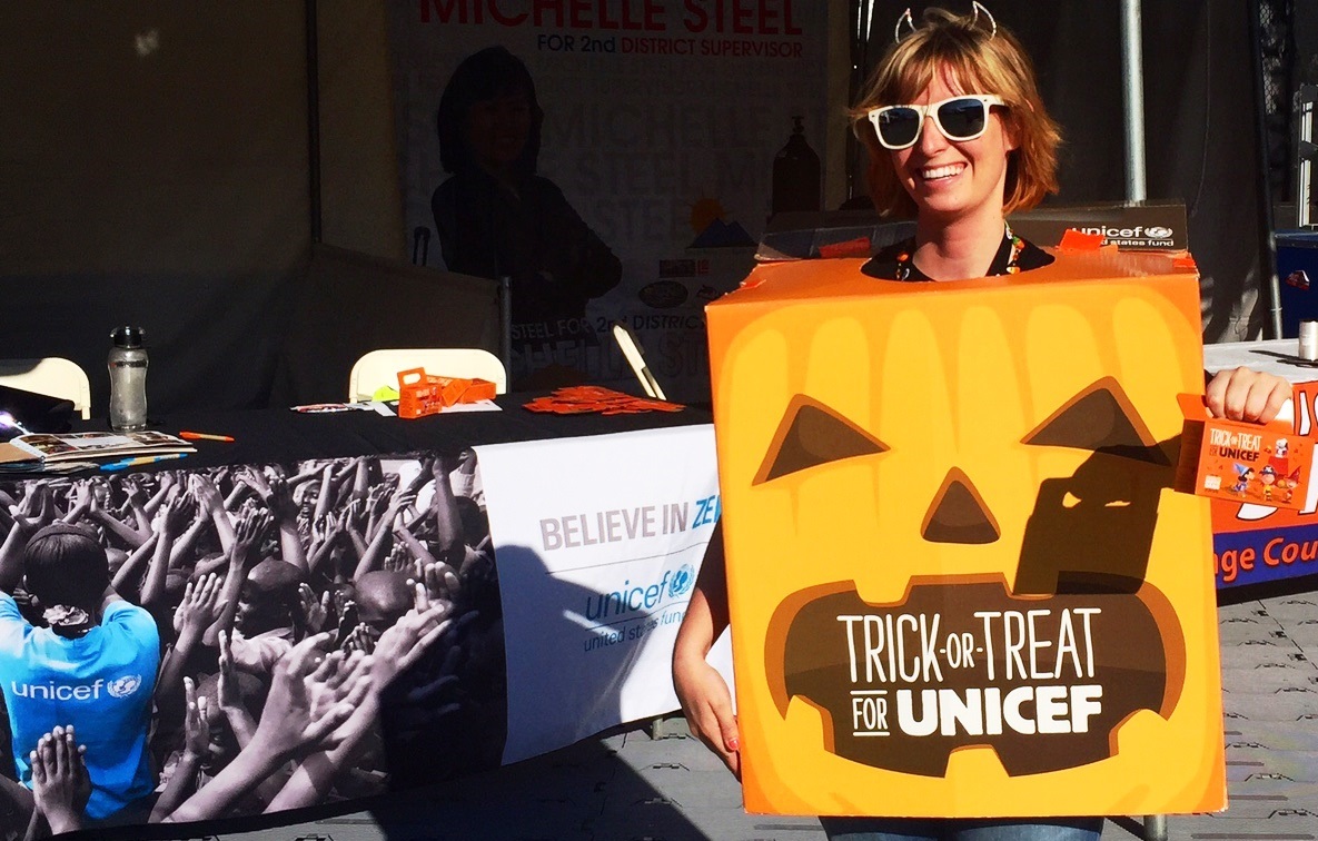 woman smiling in trick or treat box