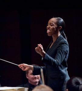 smiling woman conductor