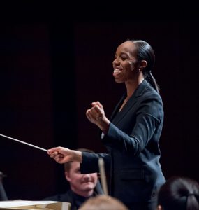 smiling woman conductor