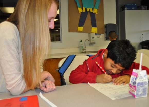 student and child studying