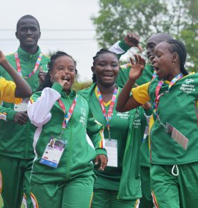 group of athletes wearing green