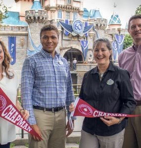 group of chapman alumni smiling at Disneyland Resort