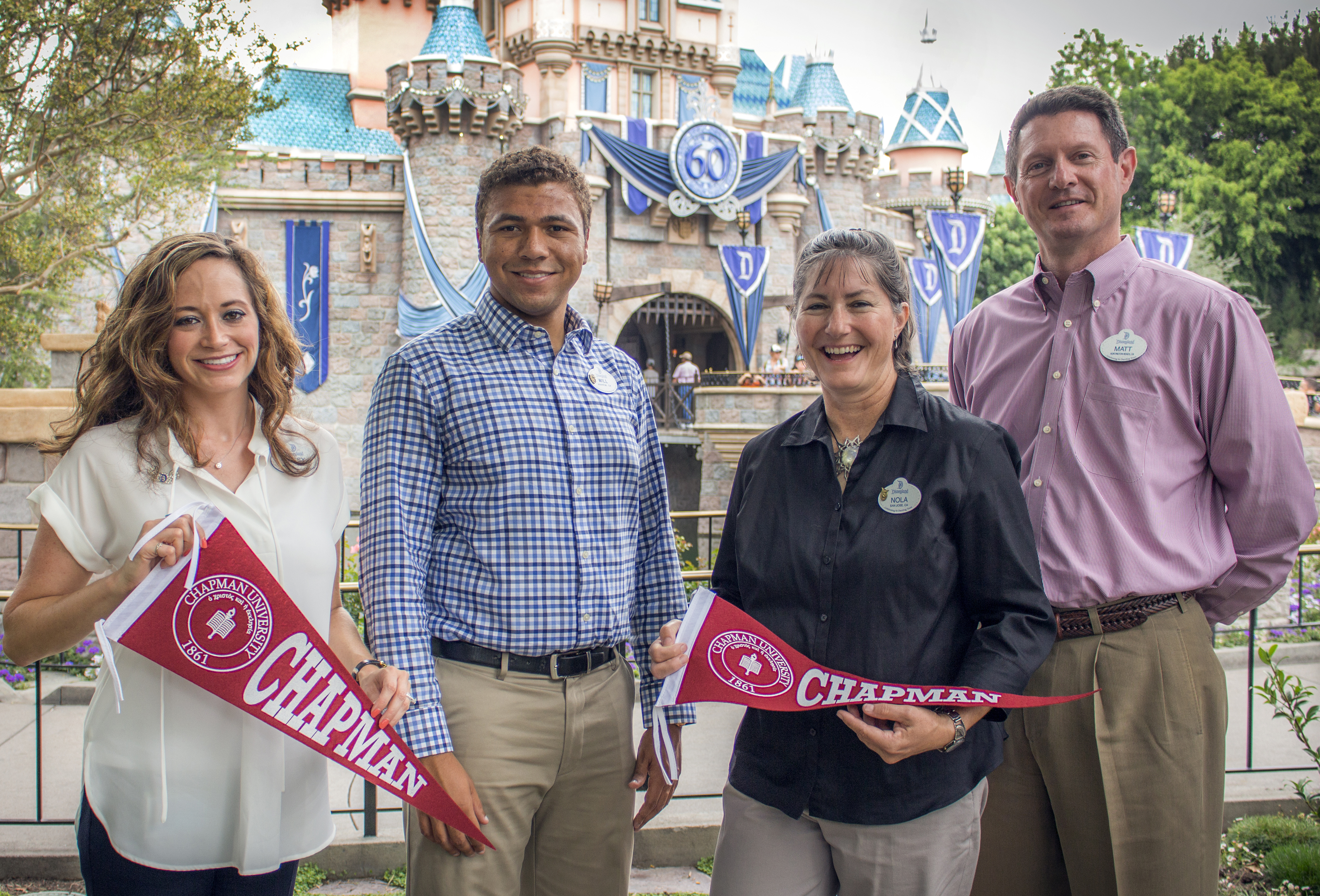 group of chapman alumni smiling at Disneyland Resort