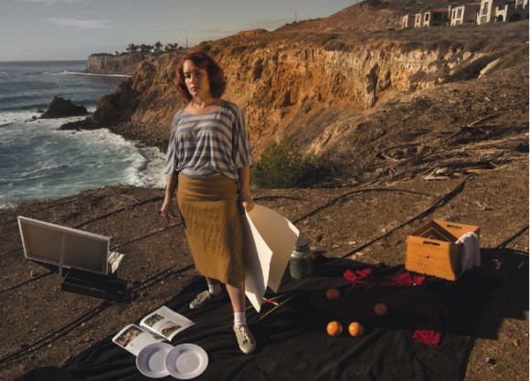 woman standing by the sea