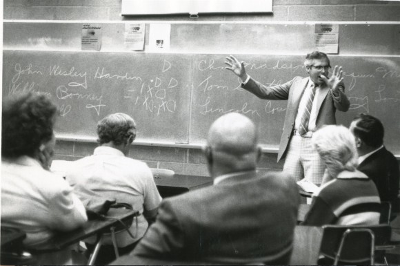 man teaching class