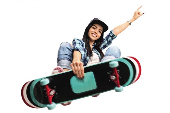 woman smiling on skateboard