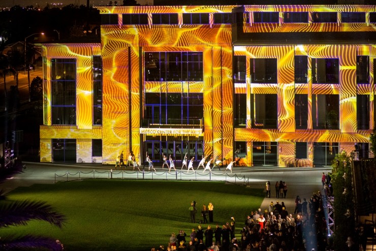 Performers in front of Musco Center for the Arts