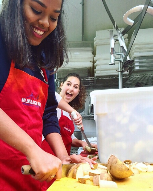 students cooking in kitchen