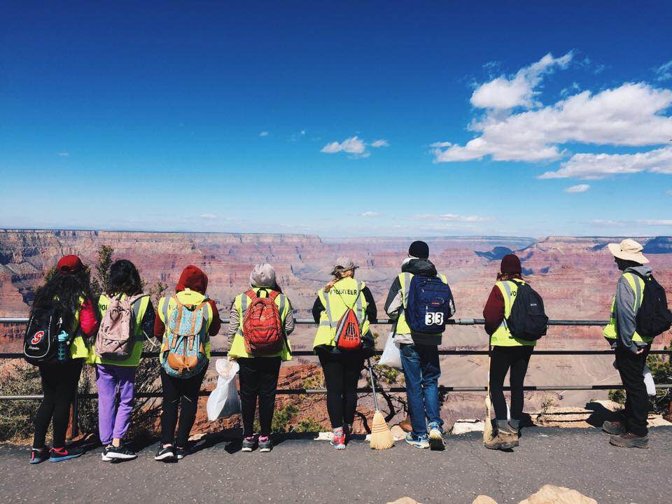 group of students overlooking the grand canyon