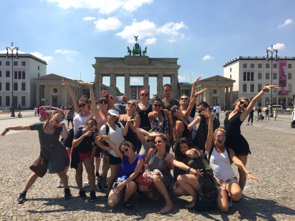 Students in front of an old gate