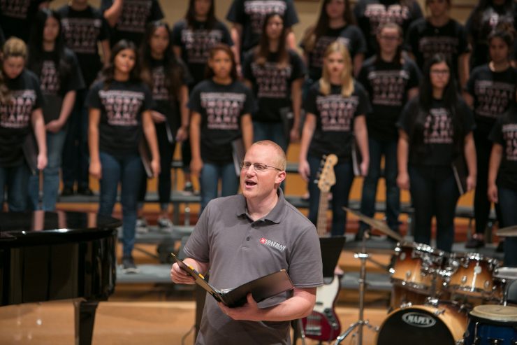 chorus director and students