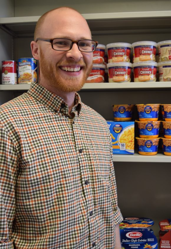 man in food bank