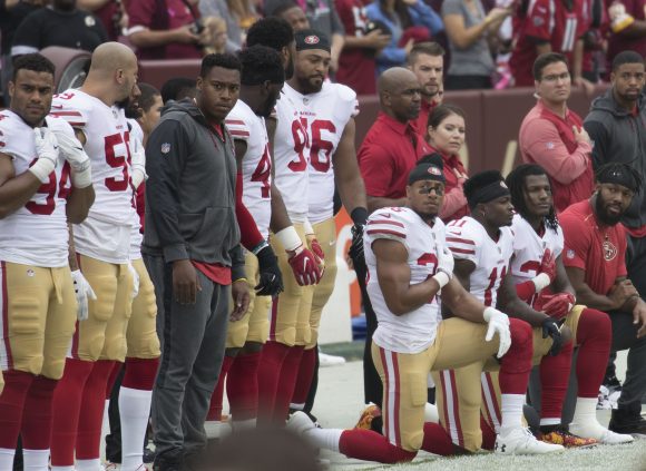 NFL players kneel in protest