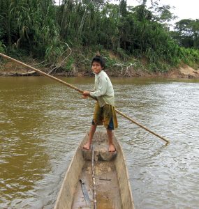 Boy on a canoe