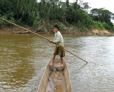 Boy on a canoe