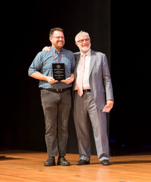 Peter Westenhofer '00 receives the President's Award.