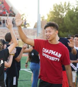 First-year Chapman University student high five