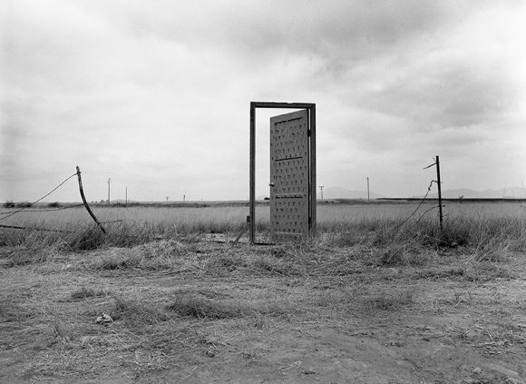 Photograph of door placed on the U.S.-Mexican border.