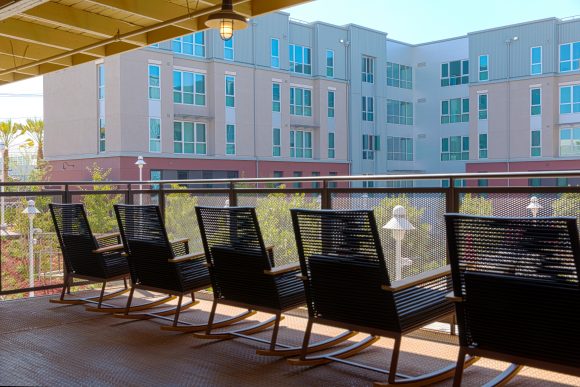 Patio with chairs over a courtyard