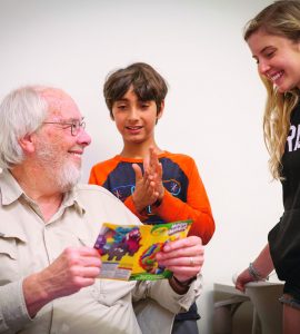 Paleontologist Jack Horner, who helps Chapman students turn learning differences into creative strengths, joins in an Eye to Eye discussion with Rumi. a middle-school student, and University mentor Ellie Hood '21.