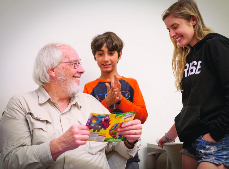 Paleontologist Jack Horner, who helps Chapman students turn learning differences into creative strengths, joins in an Eye to Eye discussion with Rumi. a middle-school student, and University mentor Ellie Hood '21.
