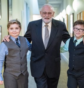 Holocaust survivor Peter Feigl meets, from left, Thomas Gnacke and Dane Kassube at Chapman University. Gnacke and Kassube took first-place in National History Day’s Junior Group Documentary Category. The students interviewed Feigl by Skype, but this was their first face-to-face meeting.