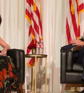 Julianne Argyros and former President Bush enjoy a light moment during their Q&A dialogue at the Argyros School celebration dinner.