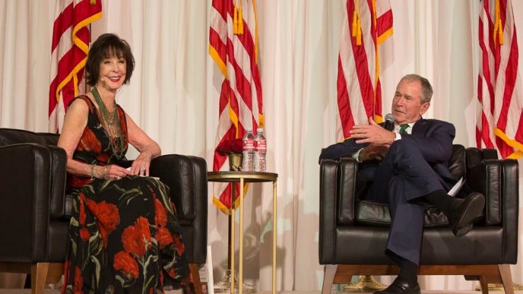 Julianne Argyros and former President Bush enjoy a light moment during their Q&A dialogue at the Argyros School celebration dinner.